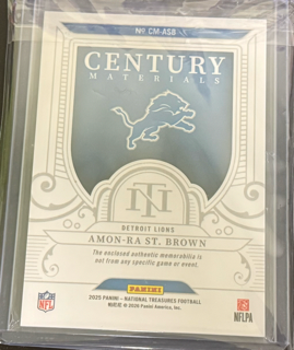 2025 Panini National Treasures Football - Amon-RA St. Brown CM-ASB - Century Materials /49